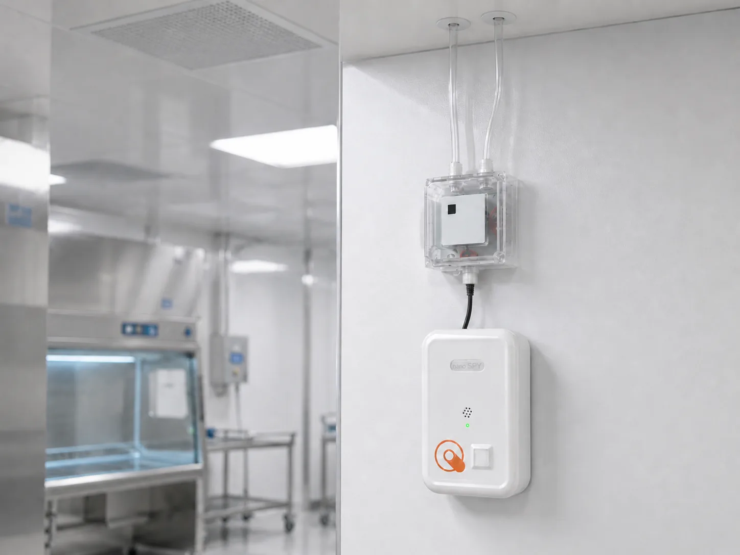 Nano SPY sensor with differential pressure probe, mounted on a cleanroom wall